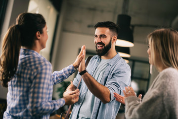 Successful teamwork. Business people in office.	