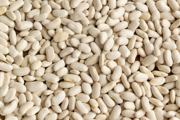 White raw aw beans background. Natural protein legume food