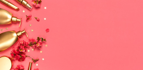 Cosmetics Branding Concept. Cosmetics, spring pink flowers, gold stars confetti on pink background....