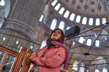 Tourist Girl Inside Blue Mosque. Sultan Ahmed Mosque, Istanbul Turkey
