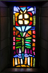 Nazareth, Israel, January 25, 2020: Basilica of the Annunciation - colorful stained glass windows