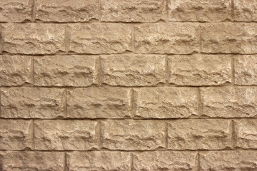 Old grey brick wall with plaster, background, texture