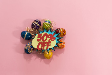 Top view of easter eggs. 50% off pop style.