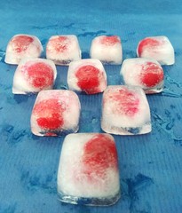 ice with cherry on a blue background