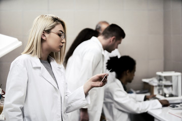 Fototapeta premium Laboratory scientist working at lab with test tube