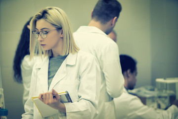 Fototapeta premium Laboratory scientist working at lab with test tube