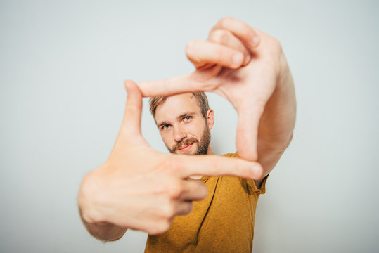 man making frame hand