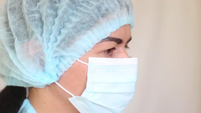 Close up face of medical worker. Pandemic medical health risk concept