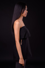 Naklejka premium Profile view of young beautiful Asian woman