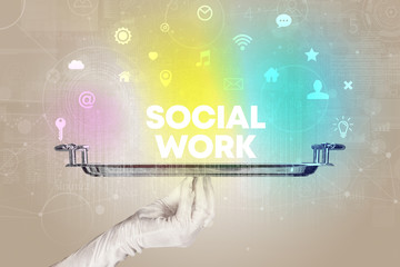 Waiter serving social networking with SOCIAL WORK inscription, new media concept