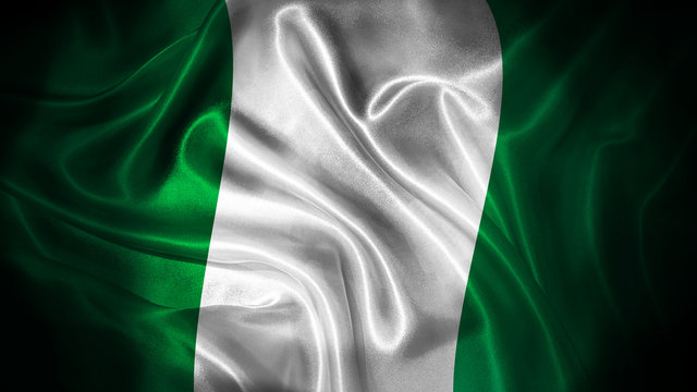 Close up waving flag of Nigeria. National Nigeria flag.
