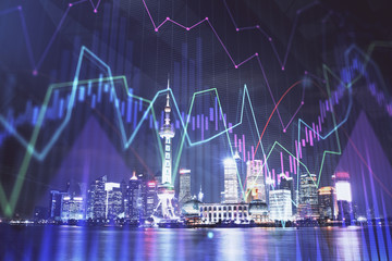 Naklejka premium Financial graph on night city scape with tall buildings background multi exposure. Analysis concept.