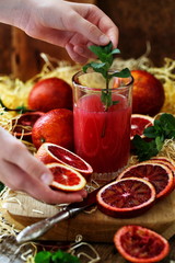Red Moroccan oranges on a straw
