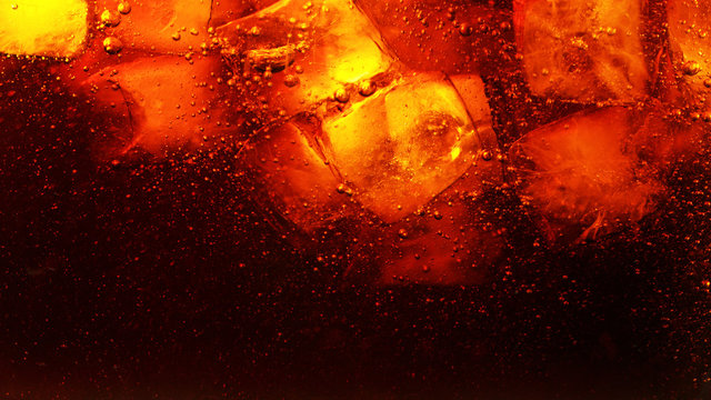 Detail of cola drink with ice cubes