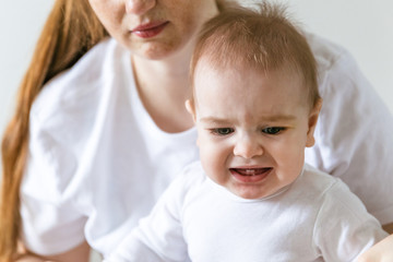 Crying nine month old baby. How to put your baby to sleep. Painful teething