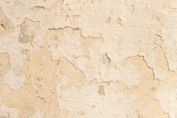 Obraz premium Old cracked and peeled wall with peeling stucco