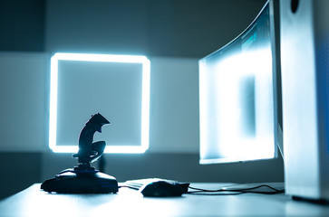 The desktop for video gaming on the illuminated background © Artem