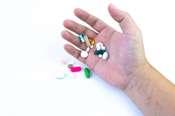 Medical / surgical face mask on hand cart and anti-virus hand sanitizer.Covid-19 concept.White background medicine and men's hands