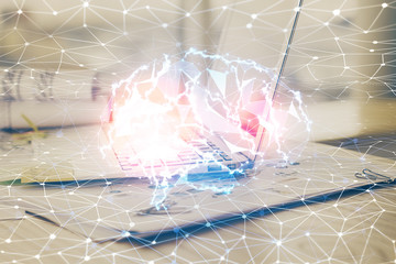 Multi exposure of work space with computer and human brain hologram. Brainstorm concept.