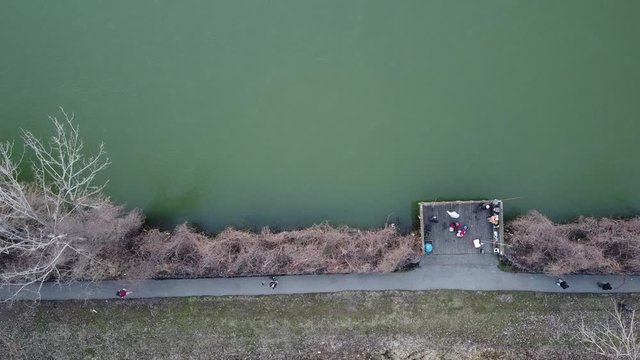 People fishing the Detroit River near Monroe Michigan. Top down view