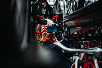 Girl takes a Picture of Bikes in Amsterdam