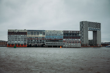 Fototapeta na wymiar Modern Buildings from boat in Amsterdam