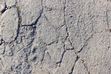 Cracked grey asphalt city heat summer heat