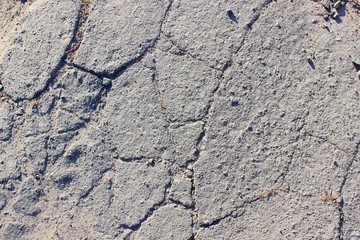 Cracked grey asphalt city heat summer heat