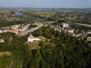 Fototapeta na wymiar Aerial view of city Halych with ruined castle on hill, river and horisont