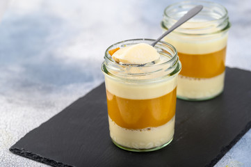 Dessert. Coconut milk panna cotta with mango, italian dessert, homemade on a light background