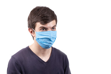 Young man in medical mask. Epidemic Coronavirus 2019-nCoV.