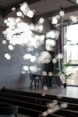 Abstract background with sprinkles. Blurred interior. Sun glare. 