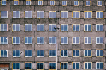 house without plaster and a lot of plastic windows