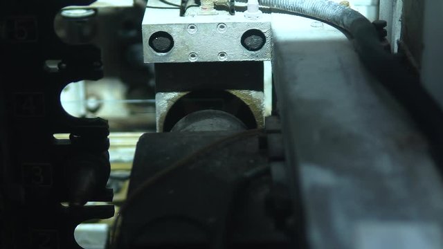 Clip of a glass manufacturing industry manufacturing and processing of ESG glasses. Close up of a machine