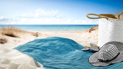Zelfklevend Fotobehang towel on sand and beach background  © magdal3na