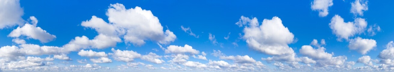 Panoramic fluffy cloud in the blue sky. Sky with cloud on a sunny day.
