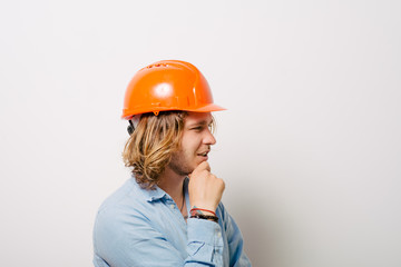 Working man thinking on a gray background