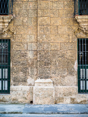 Stone wall of an old town house in havana cuba