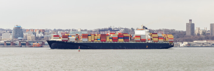 Container ship in the port during cargo operation