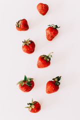 Strawberries isolated on white background. Flat lay, top view.