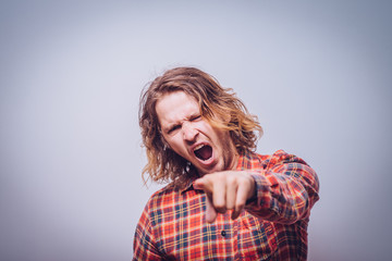 Angry man screaming