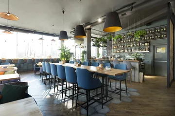 Gordijnen Stylish restaurant interior for dinner and rest with great cocktails © Prostock-studio