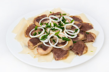 Besparmak. Thinly rolled cakes with sliced horseback sausage Kaza. Onion rings and finely chopped onion feathers