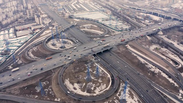 Video of the multi-level road junction in Moscow from above, car traffic and concept of transportation. road junction at the intersection of the Ryazanskiy Avenue and the Moscow ring road.