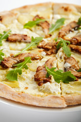 Pizza with eel, pear and cheese sauce