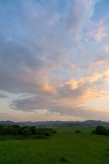 Sunrise or sunset over the hills and meadow. Slovakia