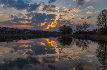 Sunset. Seeing today on the lake in the village of Luka. Kiev region. Ukraine. March 28, 2020.
