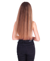 Back view portrait of a young beautiful blonde woman