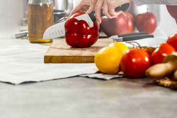 Kitchen background and hands with vegetables 