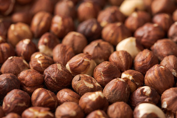 Close up view of pile of roasted hazelnuts